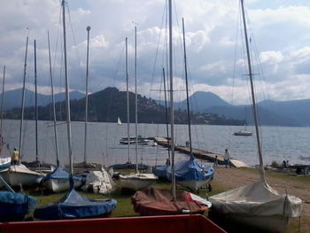 Boats moored at harbor