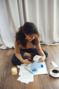 High angle view of mother and daughter at home