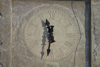 Close-up of clock on wall