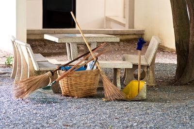 Wooden chairs and logs in basket