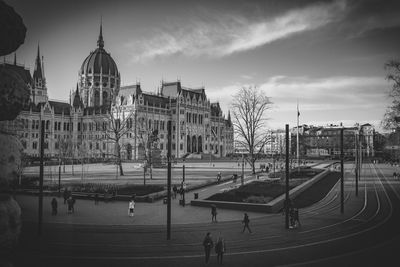 Panoramic view of buildings in city against sky