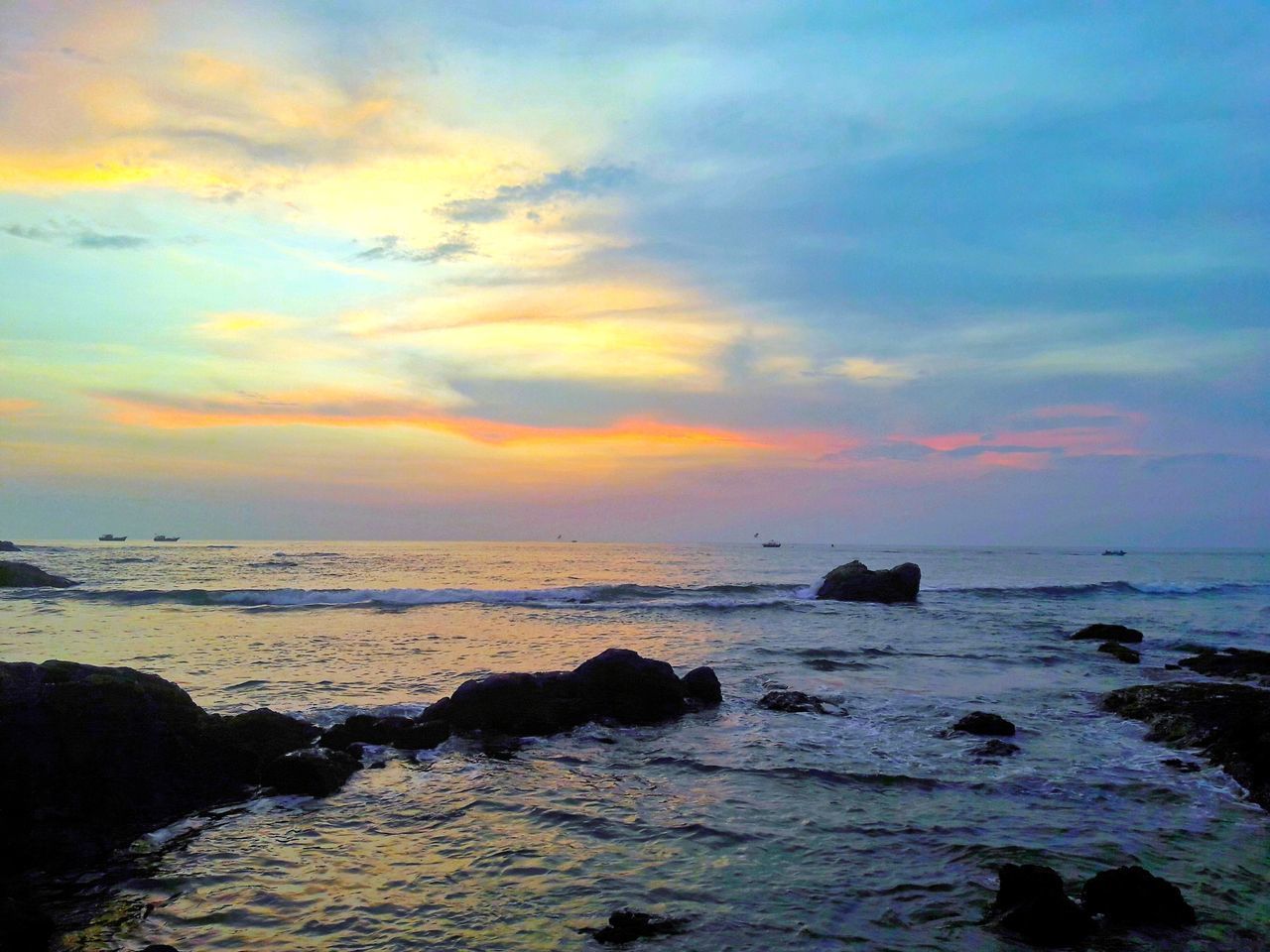 SCENIC VIEW OF SEA DURING SUNSET