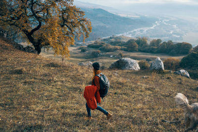 Rear view of man looking at mountains