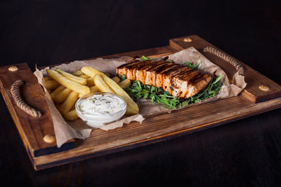 High angle view of food on table against black background