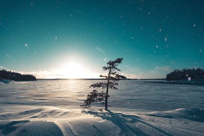 Scenic view of frozen lake against sky