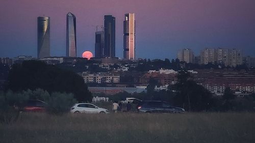 View of city buildings against sky