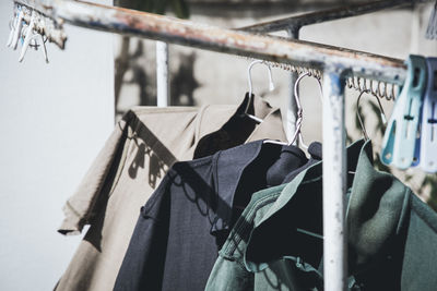 Close-up of clothes drying on rack