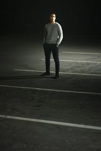 Full length of a man standing in sunlight