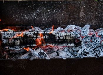 Close-up of fire on barbecue grill