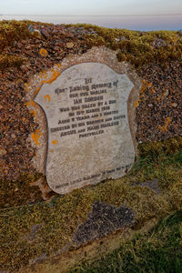 High angle view of text on stone wall