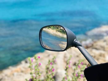 Reflection of sunglasses on water