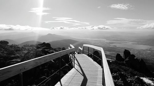 Narrow pathway along rocky landscape