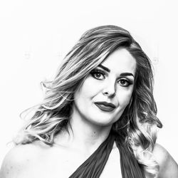 Portrait of beautiful woman against white background