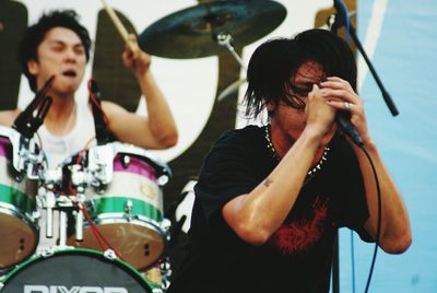 Young woman sitting on bench