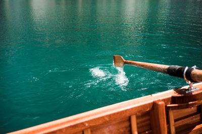 Boat and oar on sea