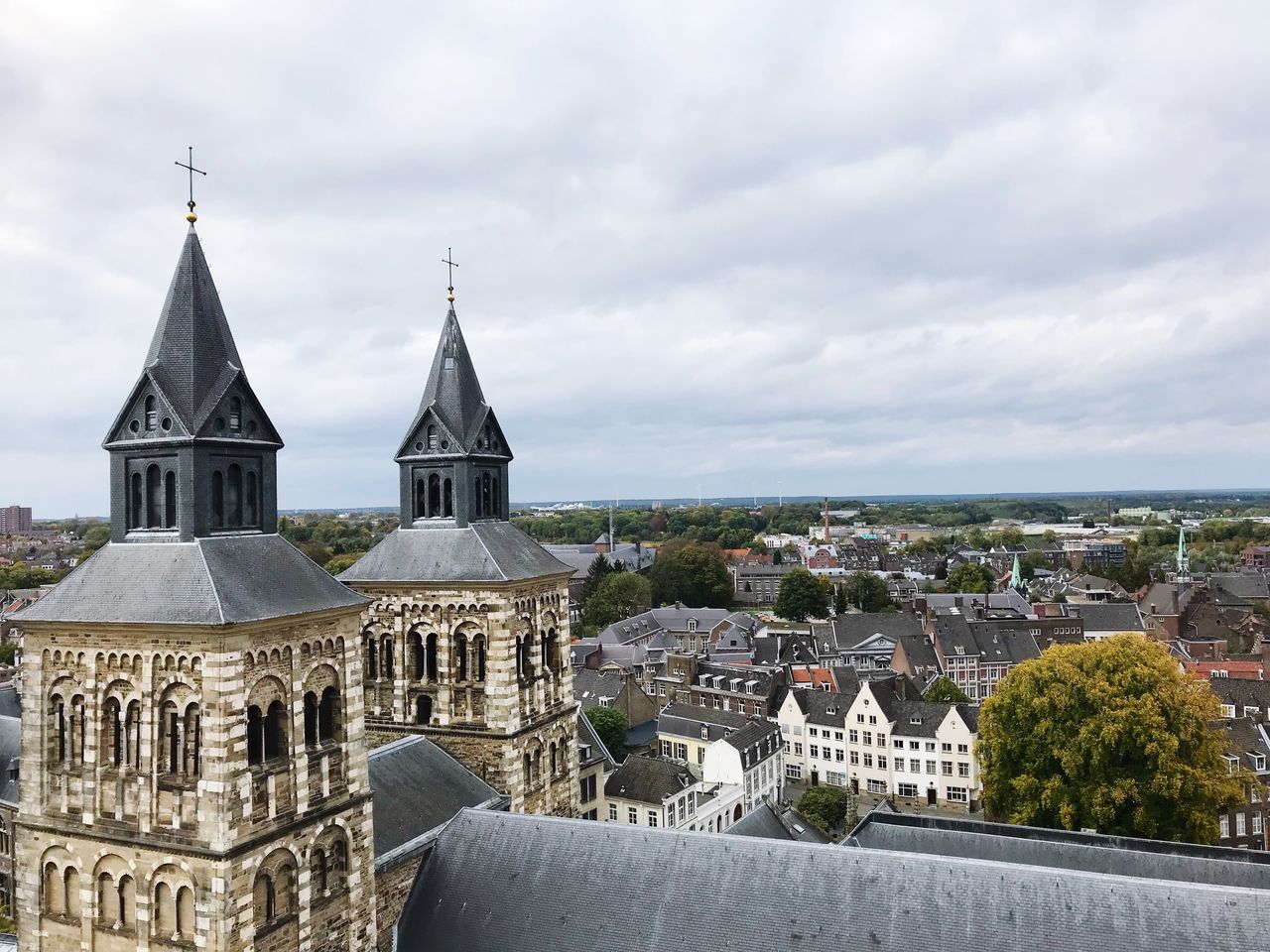 architecture, built structure, sky, religion, cloud - sky, building exterior, spirituality, outdoors, day, no people, place of worship, cityscape, city, nature