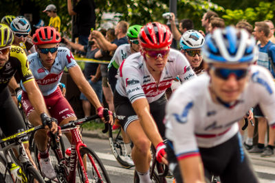 Group of people riding bicycle