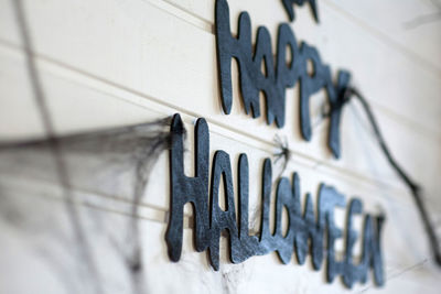 Close-up of text on wall