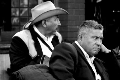 Portrait of friends sitting outdoors