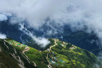 Scenic view of waterfall against sky