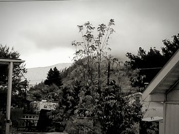 Low angle view of house against cloudy sky