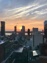 High angle view of buildings against sky during sunset