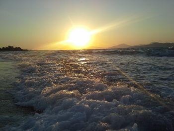 Scenic view of sea at sunset