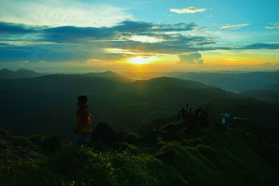 Scenic view of mountains against sky during sunset