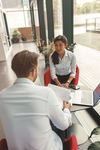 Business colleagues working in office