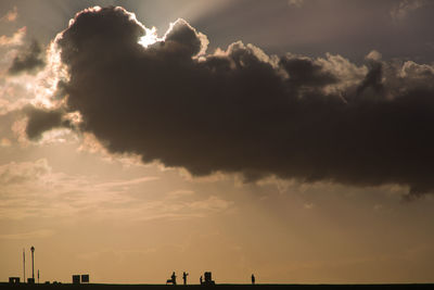 Scenic view of cloudy sky at sunset