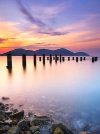 Scenic view of lake against sky during sunset