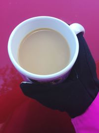 Close-up of coffee cup on table