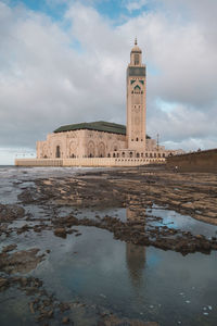 View of clock tower against cloudy sky