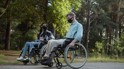 Portrait of man riding bicycles on road