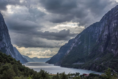 Scenic view of lysefjord and mountains against sky