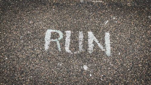 High angle view of text on road