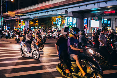 Group of people on road in city