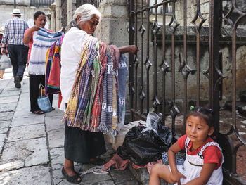 People on street in city