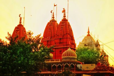 View of temple against building