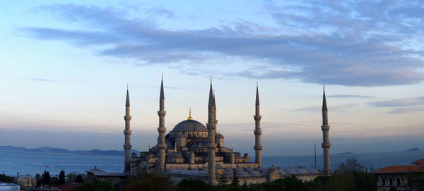 Blue mosque against sky during sunset