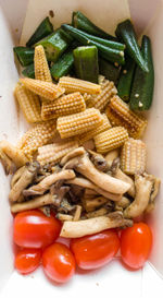 High angle view of fresh vegetables in plate