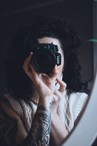 Portrait of man photographing