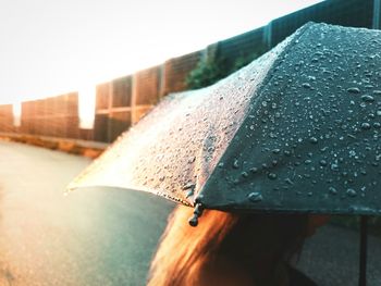 Close-up of raindrops on umbrella