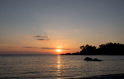 Scenic view of sea against sky during sunset