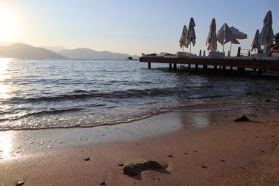 Scenic view of beach against sky