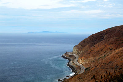 Farway shot of pacific coast highway and pacific ocean coastline