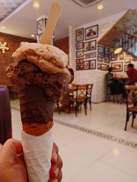 Man holding ice cream cone