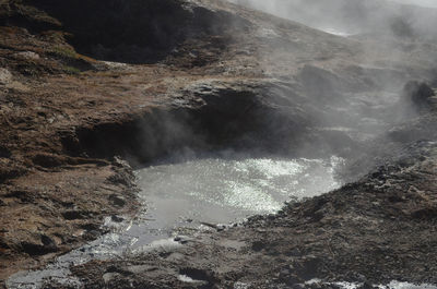 Scenic bubbling and boiling mud in a volcanic landscape in iceland.