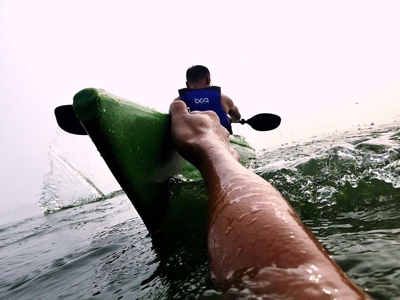 water, lifestyles, leisure activity, holding, part of, cropped, unrecognizable person, nature, day, sky, outdoors, rippled