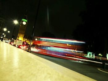 Light trails on city street at night